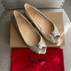 Worn x1 Christian Louboutin gold-metallic flats
